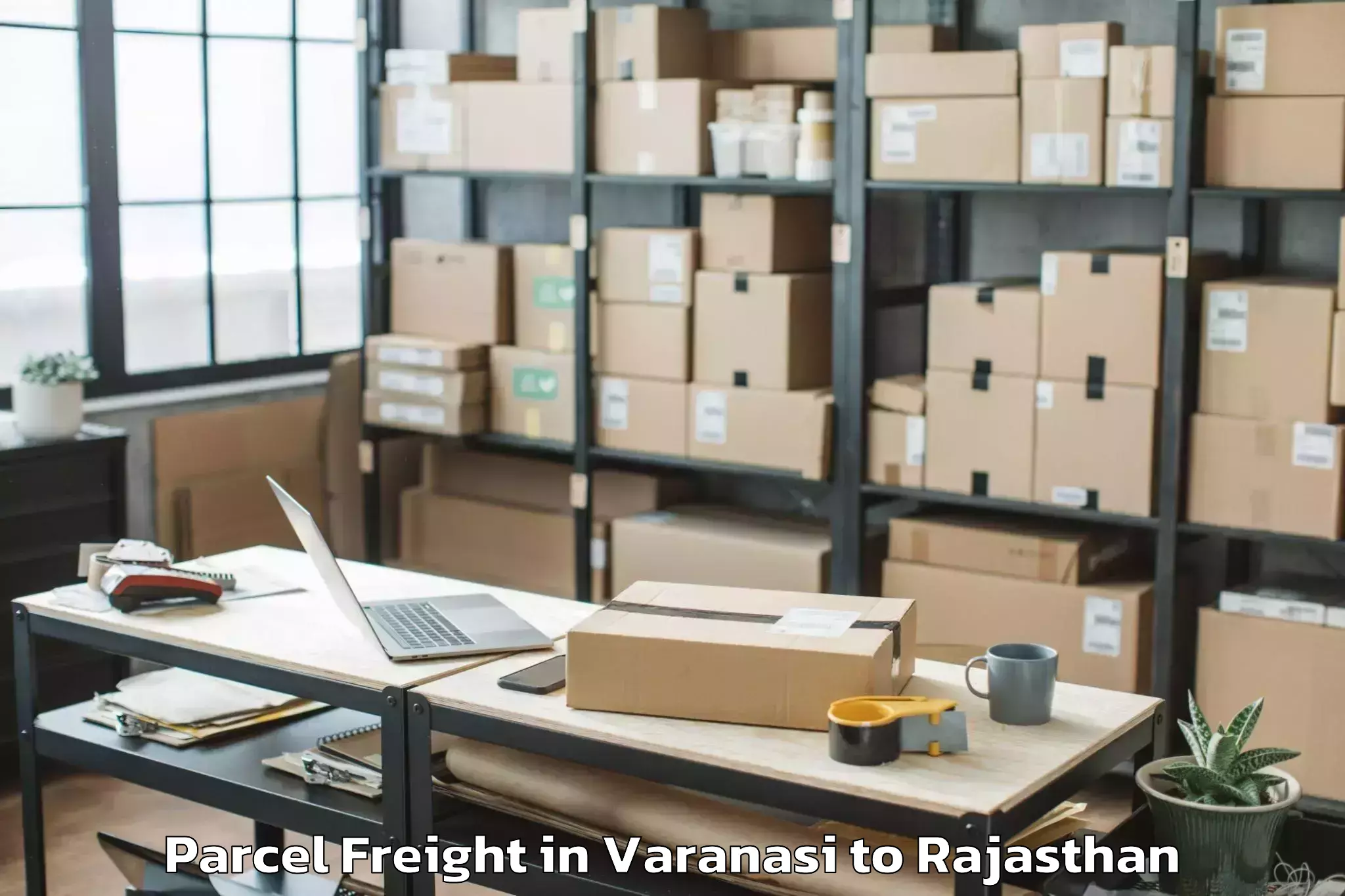 Trusted Varanasi to Rajasthan University Of Health Parcel Freight